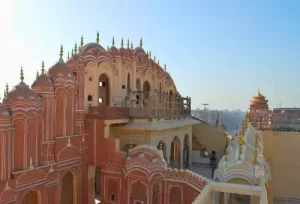10 Days Rajasthan, Agra, and Varanasi holiday tour package itinerary featuring Udaipur Lake Pichola, Jaipur Amber Fort, the Agra Taj Mahal, and a Varanasi Ganga Aarti by Aamantran Tours.