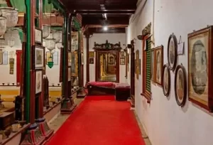 The beautiful interior exhibits of the Aina Mahal Museum, featured on the 11 Days Tour Itinerary of Gujarat.
