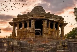 The flawless geometric architecture of the ancient Modhera Sun Temple, featured on the 18 Days Gujarat Tour Package from Ahmedabad.