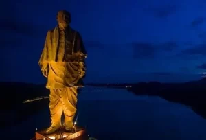 5 Days Ahmedabad Kevadia Vadodara Tour package featuring Ahmedabad heritage sites, the illuminated Statue of Unity at evening.