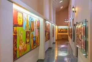 5 Days Gujarat Saurashtra Tour Itinerary featuring historical exhibits inside a Rajkot museum.
