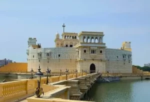 The beautiful historic Lakhota Palace situated in the center of Lakhota Lake in Jamnagar, featured on the 6 Days Gujarat Kathiyawad Tour.