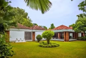The peaceful surroundings of the historic Sabarmati Ashram in Ahmedabad, the former residence of Mahatma Gandhi, featured on the 8 Days Gujarat Package Tour.