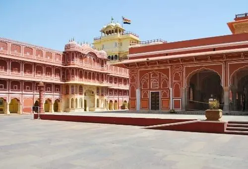 The stunning architecture of Jaipur City Palace, marking the starting point for authentic Rajasthan package tours by Aamantran Tours.