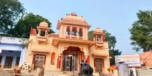 The sacred Harni Mahadev Temple in Bhilwara, Rajasthan, featuring a hillside stone structure surrounded by scenic greenery.