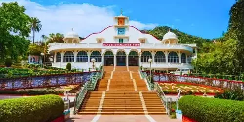 The lush green gardens and tranquil meditation spaces of the Brahma Kumari Peace Park, nestled in the scenic Aravalli hills of Mount Abu, Rajasthan.